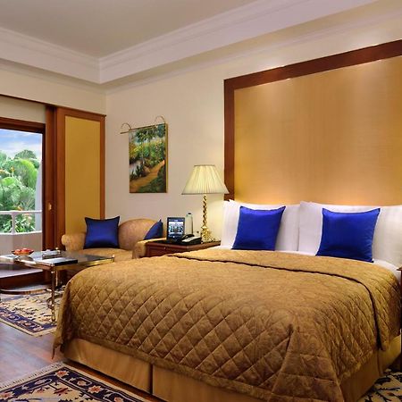 The Oberoi Bengaluru Hotel Exterior foto A room at the Taj Bengal